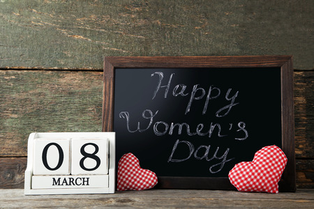 Cube calendar with fabric hearts and wooden frameの写真素材