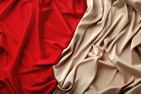 Background of red and beige satin fabricの写真素材