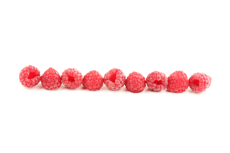 Ripe raspberries isolated on white background