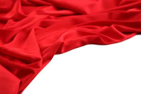 Red satin cloth on white backgroundの写真素材