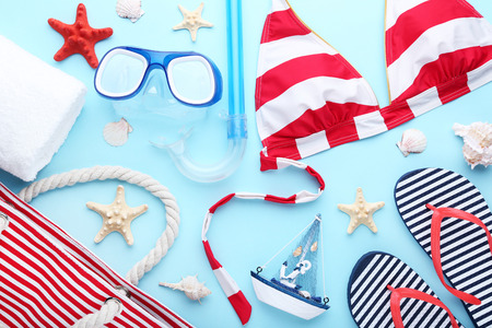 Summer accessories with seashells and decorative ship