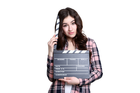 Young woman with clapper board on white backgroundの写真素材