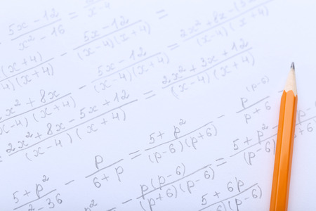 Exercise book with maths formulas and pencilの写真素材