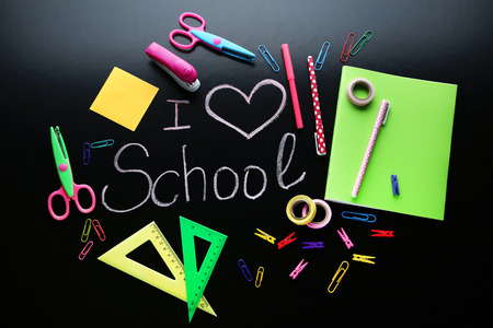 Inscription I Love School on chalkboard with school suppliesの写真素材