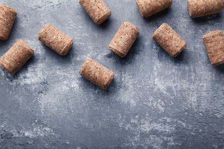 Wine corks on grey wooden tableの写真素材