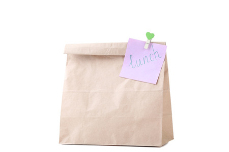 Paper bag with school lunch on white backgroundの写真素材