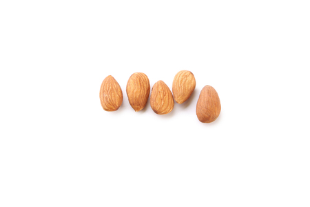 Almonds isolated on a white backgroundの写真素材