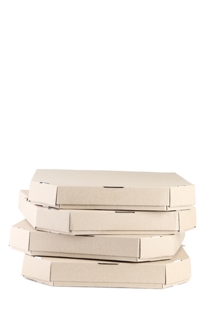 Stack of pizza boxes isolated on white backgroundの写真素材