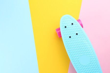 Skateboard on colorful background