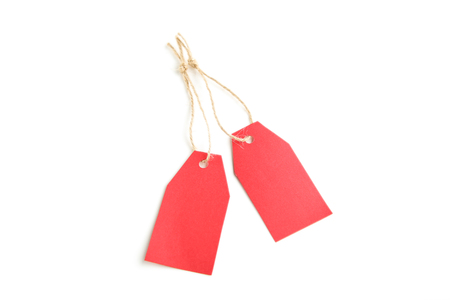 Red sale tags isolated on white backgroundの写真素材