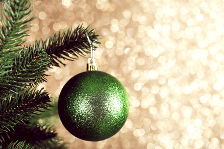 Christmas tree with bauble toy on blurred backgroundの写真素材