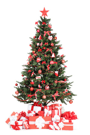 Christmas tree with decorations and gift boxes isolated on white backgroundの写真素材