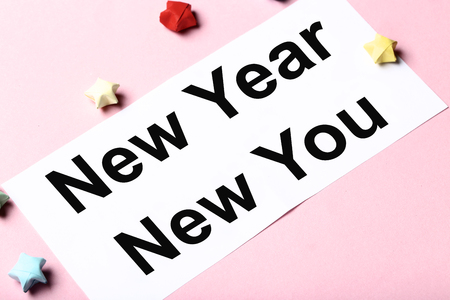 New year new you on sheet of paper with colorful starsの写真素材