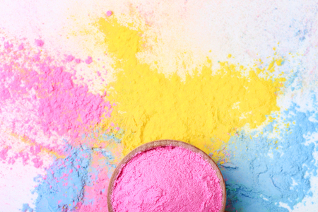 Colorful holi powder on white backgroundの写真素材