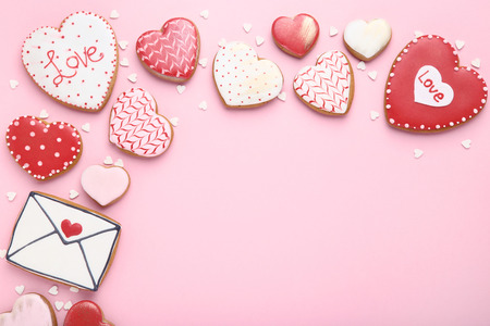 Valentine day cookies with heart shaped sprinkles on pink backgroundの写真素材