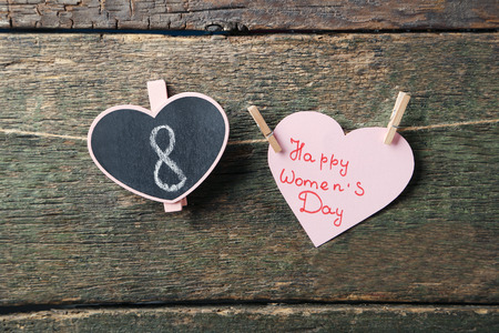 Inscription Happy women's day on paper heart