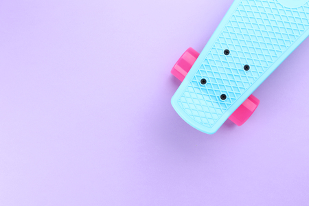Skateboard on purple backgroundの写真素材