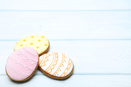 Easter gingerbread cookies on wooden table