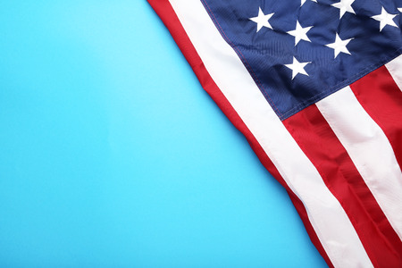 American flag on blue backgroundの写真素材