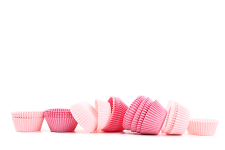 Cupcake cases isolated on white backgroundの写真素材