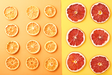 Dried citrus fruits on colorful backgroundの写真素材