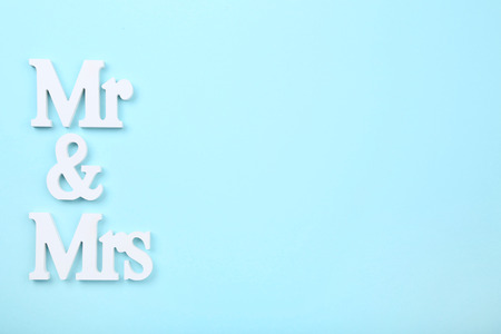 White letters Mr and Mrs on blue background
