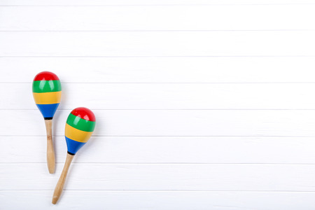 Mexican maracas on white wooden tableの写真素材