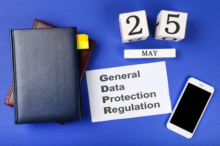 General Data Protection Regulation, GDPR with notepads, smartphone and cube calendarの写真素材