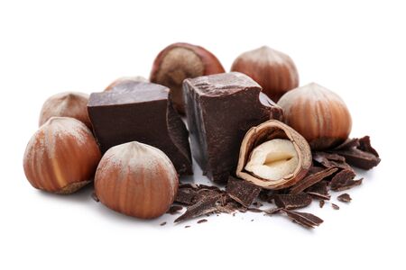Hazelnuts with chocolate isolated on white backgroundの写真素材