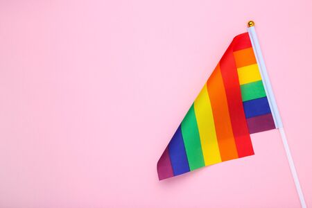 Rainbow flag on pink backgroundの写真素材