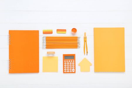 School supplies on white wooden tableの写真素材