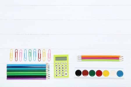 School supplies on white wooden tableの写真素材