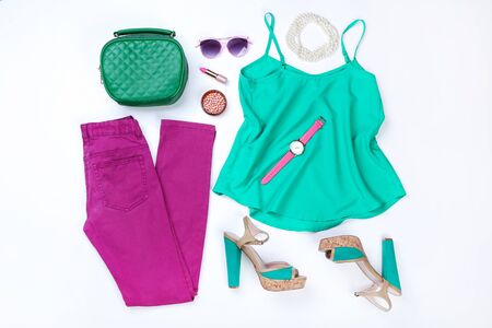 Stylish women's clothes with sunglasses and accessories on white backgroundの写真素材