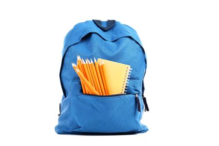 Backpack with notepad and pencils isolated on white backgroundの写真素材