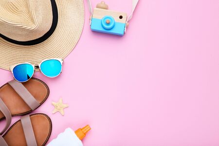Fashion clothing with sunscreen and starfish on pink backgroundの写真素材