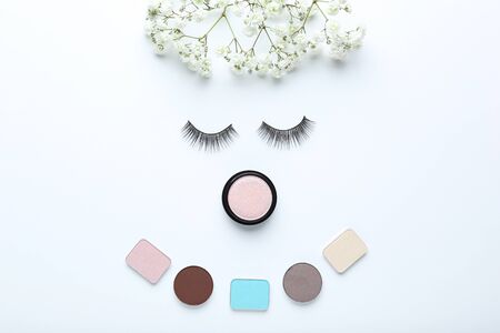 Makeup shadows with eyelashes and eustoma flowersの写真素材
