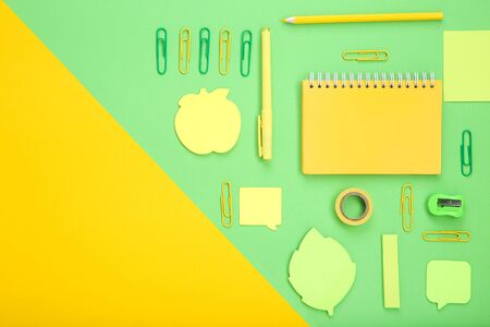 Different school supplies on colorful