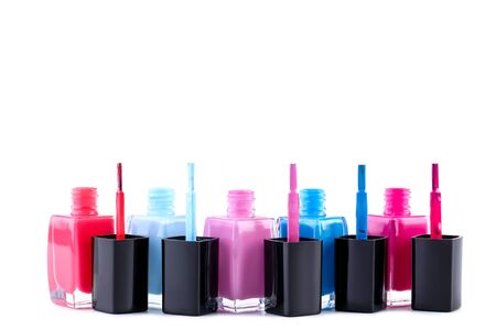 Nail polish bottles isolated on whiteの写真素材