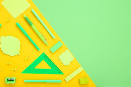 Different school supplies on colorful backgroundの写真素材