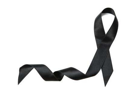 Black ribbon on white background. Mourning conceptの写真素材