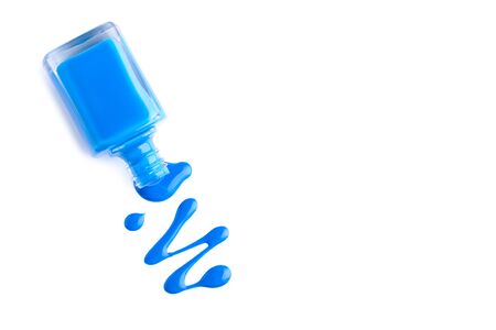 Nail polish splatters and bottle isolated on white backgroundの写真素材