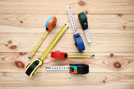 Construction roulettes on brown wooden table