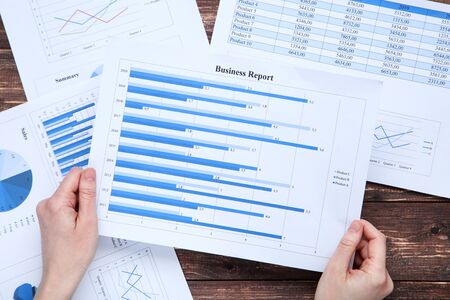 Woman working with financial papersの写真素材