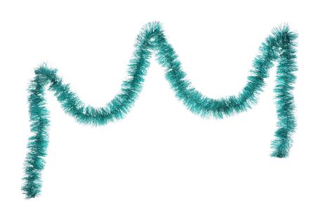 Christmas tinsel hanging on white backgroundの写真素材