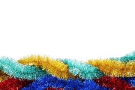 Colorful christmas tinsel on white backgroundの写真素材