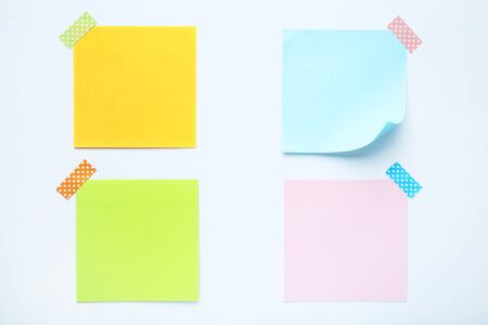Paper sticky notes on white background