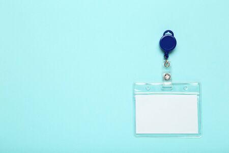 Blank white bagde on blue background