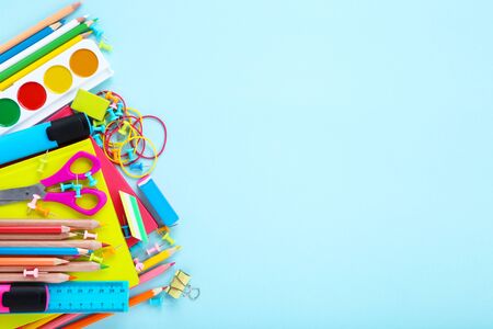 Different school supplies on blue backgroundの写真素材