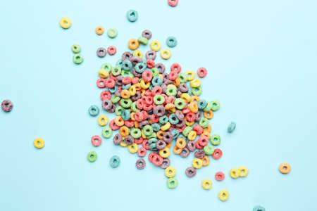 Colorful corn rings on blue backgroundの写真素材