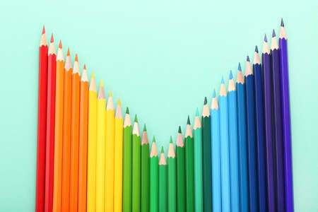 Colored pencils on mint backgroundの写真素材